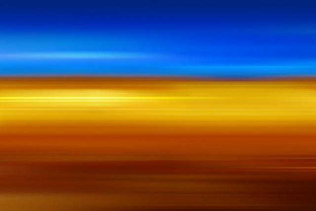 Blurry blue yellow sky plane free wallpaper - medium preview image