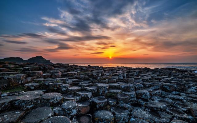 Sunset rocky beach cityscape water #2 free wallpaper - medium preview image