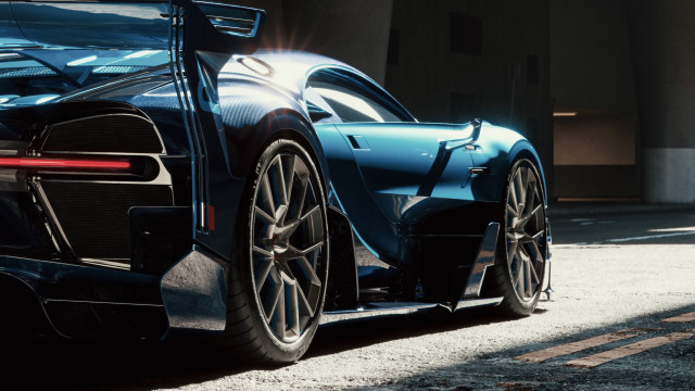 Blue sports car parked sunlight free wallpaper - medium preview image