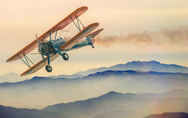 Small airplane dieselpunk mountains orange free wallpaper - medium preview image