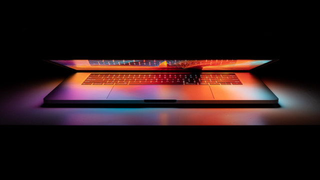 Laptop colorful keyboard reflection sunset free wallpaper - medium preview image