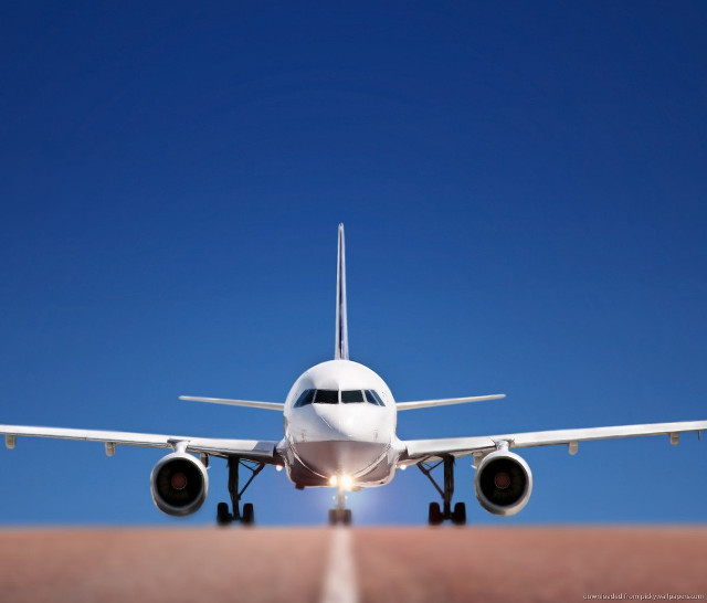 Jetliner flying blue sky runway #5 free wallpaper - medium preview image