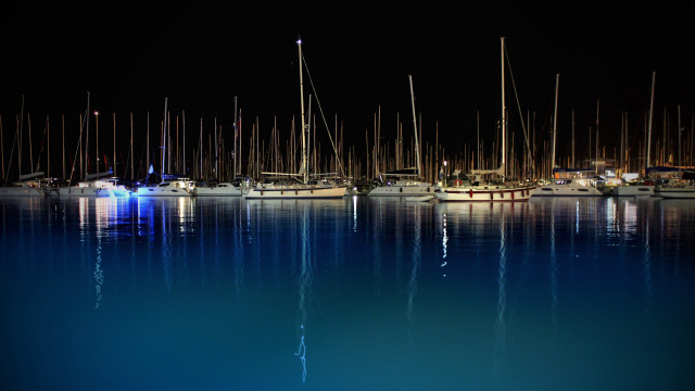 Boats reflection night city lights free wallpaper - medium preview image
