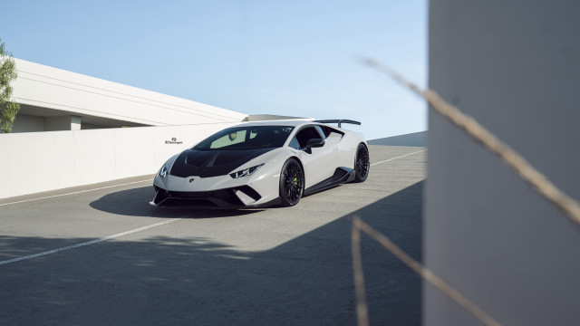 White sports car parking lot #12 free wallpaper - medium preview image
