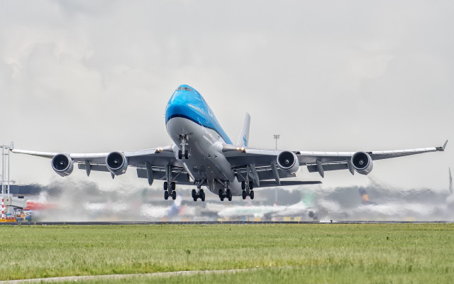 Jetliner takeoff smoke arabesque photo free wallpaper - medium preview image