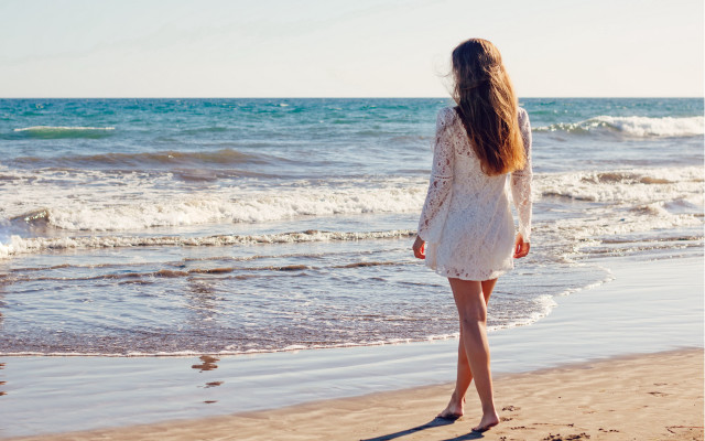 Beach woman ocean wind impressionist free wallpaper - medium preview image