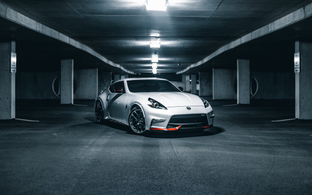 White sports car parking garage #2 free wallpaper - medium preview image