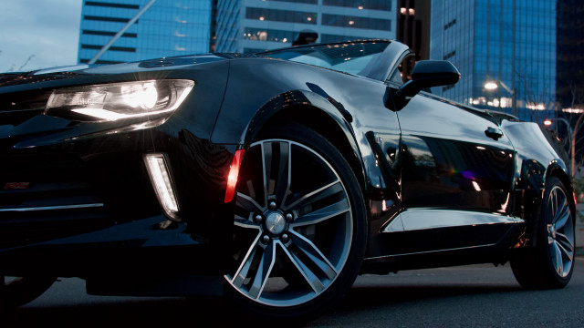 Black car tall building city free wallpaper - medium preview image
