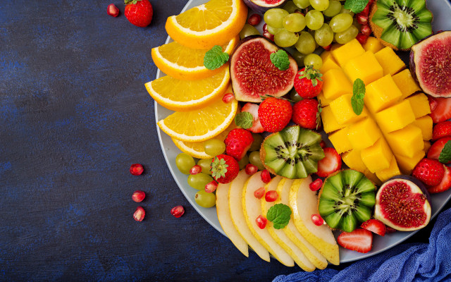 Plate fruit orange grapes kiwi free wallpaper - medium preview image