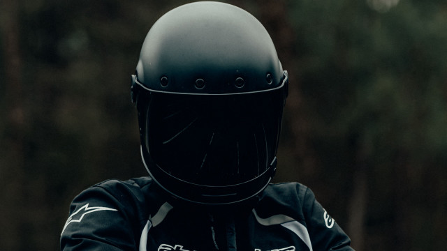 Helmet motorcycle forest portrait blurry free wallpaper - medium preview image