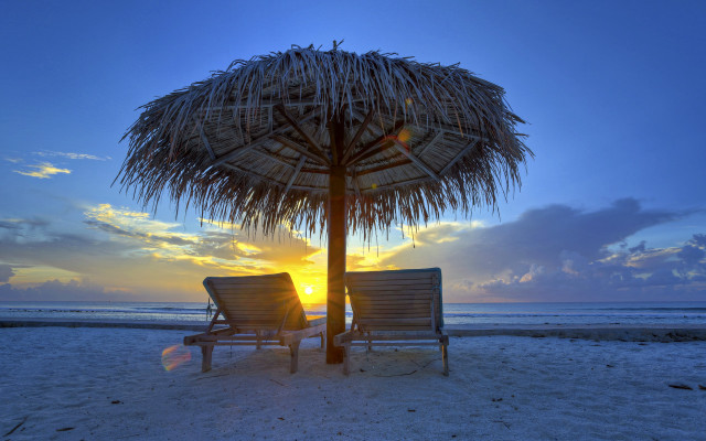 Beach sunset chairs umbrella ocean free wallpaper - medium preview image