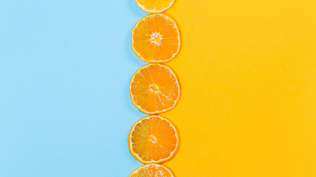 Orange slices yellow blue background free wallpaper - medium preview image