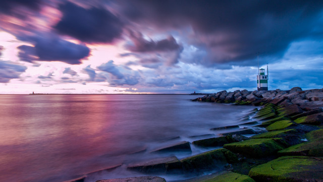 Lighthouse rocky shore mystical sky free wallpaper - medium preview image