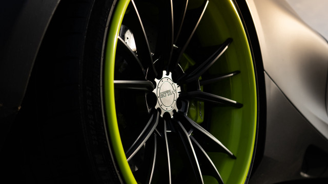 Car wheel green rim spokes free wallpaper - medium preview image
