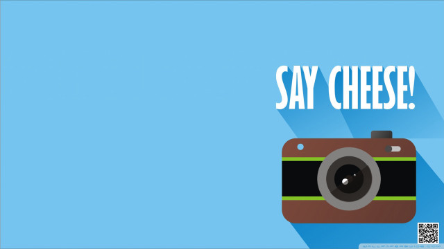 Camera say cheese blue background free wallpaper - medium preview image