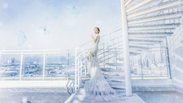 Woman white dress balcony cityscape #2 free wallpaper - medium preview image