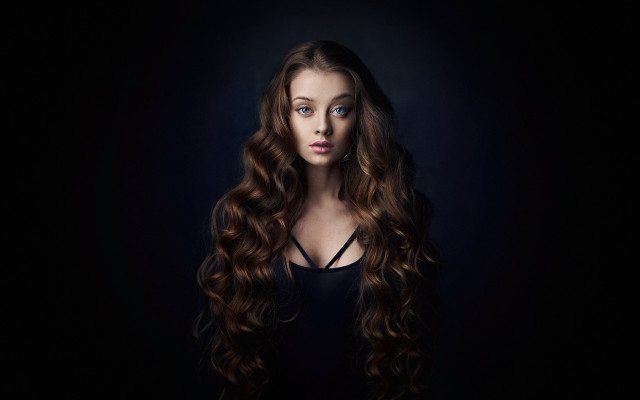 Woman curly long hair blue free wallpaper - medium preview image