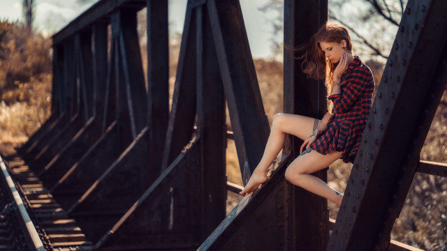 Woman leaning bridge cellphone autumn free wallpaper - medium preview image