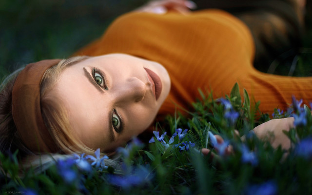 Woman lying flower field blue free wallpaper - medium preview image