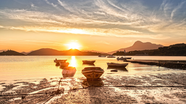 Sunset boats water beach lighthouse free wallpaper - medium preview image