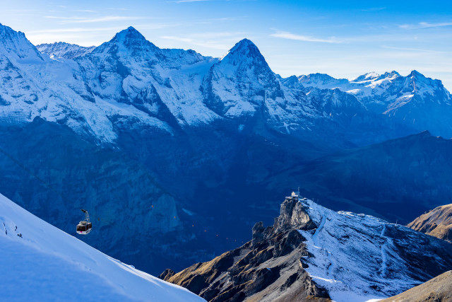 Snowboarder snowy mountain top background free wallpaper - medium preview image