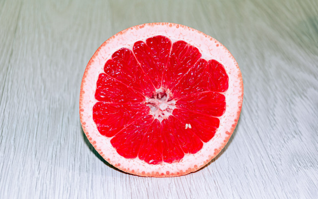 Grapefruit half tabletop white background free wallpaper - medium preview image