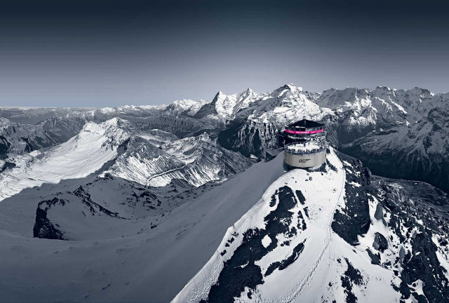 Snowboarder jumping snowy mountain peak free wallpaper - medium preview image