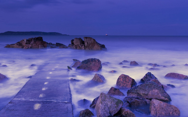 Pier rocky beach ocean night free wallpaper - medium preview image
