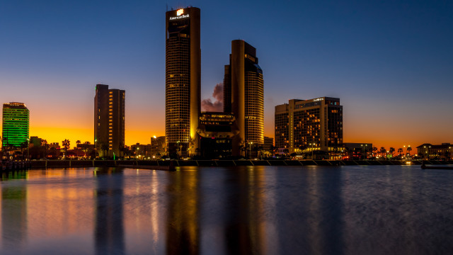 City skyline night water orange free wallpaper - medium preview image