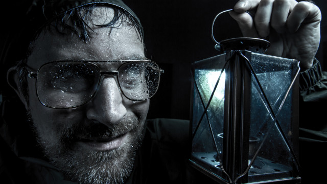 Man glasses lantern light portrait free wallpaper - medium preview image