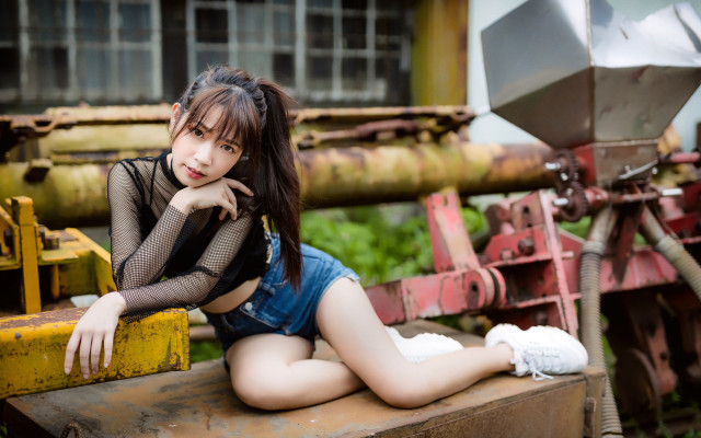 Woman sitting bench machine building free wallpaper - medium preview image