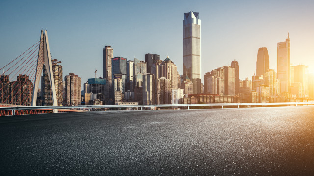 Futuristic city skyline bridge night free wallpaper - medium preview image