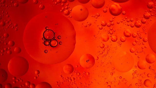 Red liquid bubbles macro oil free wallpaper - medium preview image