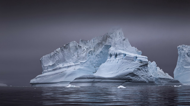 Iceberg ocean dark sky mountains free wallpaper - medium preview image