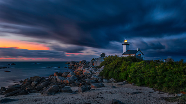 Lighthouse rocky shore sunset mystical free wallpaper - medium preview image
