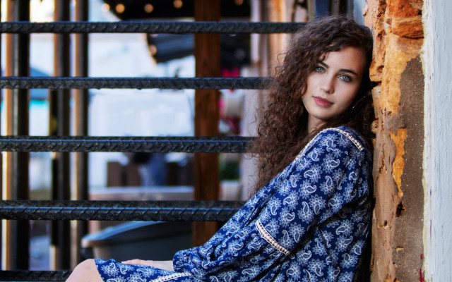 Woman ledge wall window fence free wallpaper - medium preview image