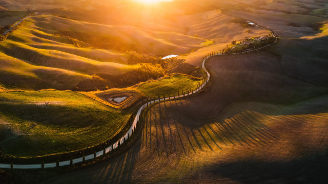 Winding road sunset field tilt free wallpaper - medium preview image