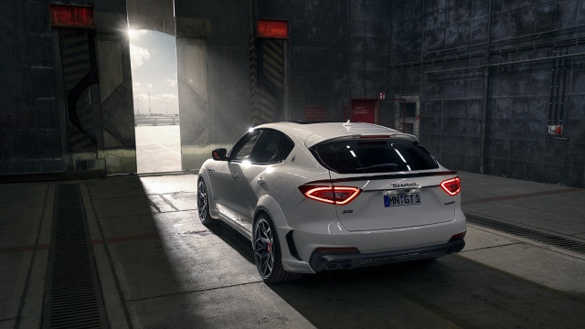 White car parking garage building #2 free wallpaper - medium preview image