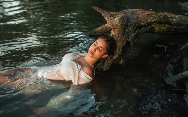 Floating woman tree log water free wallpaper - medium preview image