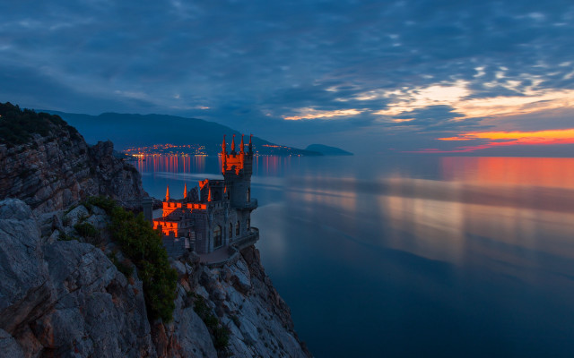Castle cliff ocean sunset mystical free wallpaper - medium preview image