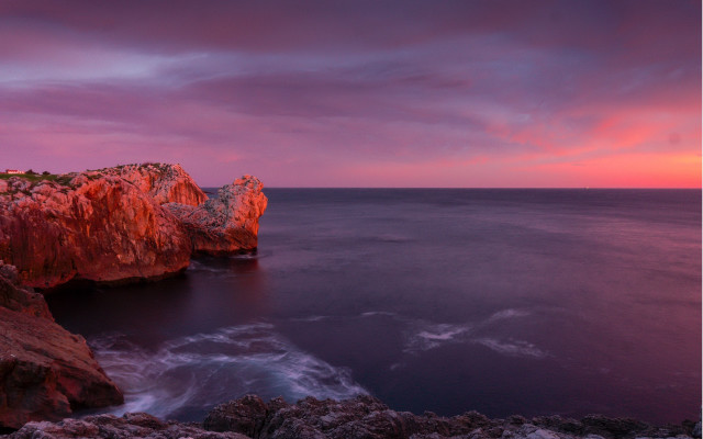 Rocky cliff water sunset mystical free wallpaper - medium preview image