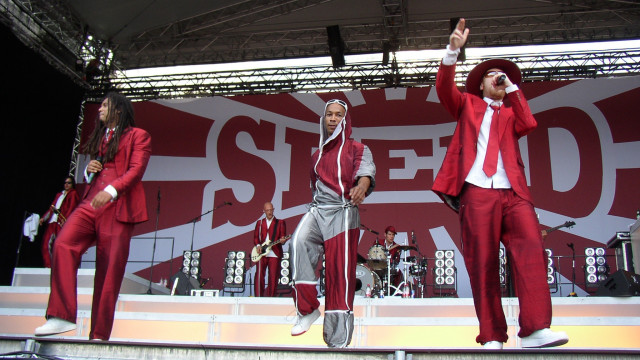 Men red suits stage seed free wallpaper - medium preview image