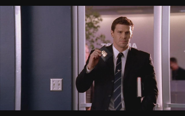 Man suit tie holding looking free wallpaper - medium preview image