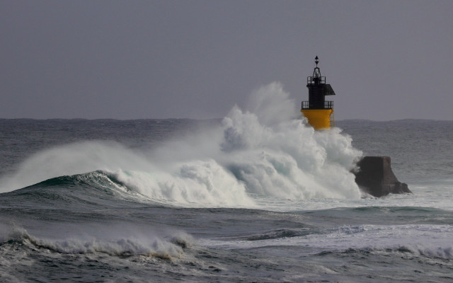 Lighthouse wave stormy ocean cloudy free wallpaper - medium preview image