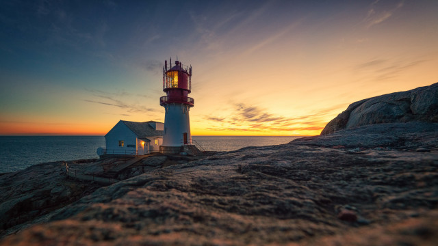 Lighthouse rocky cliff sunset house free wallpaper - medium preview image