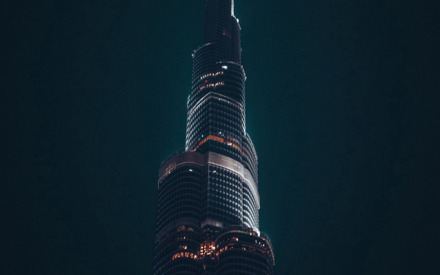 Tall building lit night sky free wallpaper - medium preview image