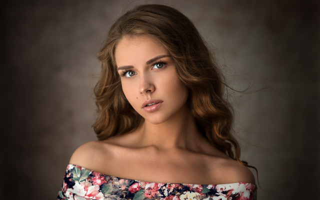 Woman floral top serious portrait free wallpaper - medium preview image