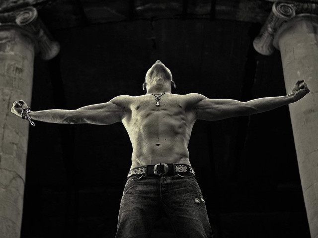 Man arms outstretched building pillars free wallpaper - medium preview image