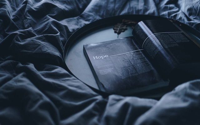 Black book on bed cinematic free wallpaper - medium preview image