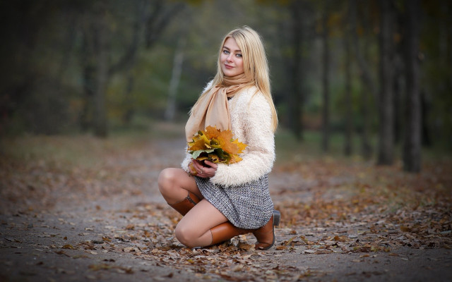Woman kneeling flowers forest portrait free wallpaper - medium preview image